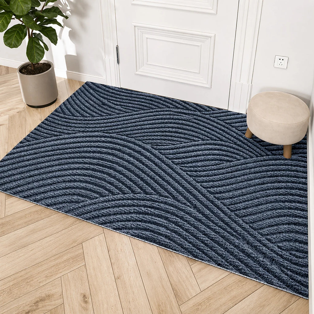 Textured polypropylene door mat surface that traps dirt and moisture
