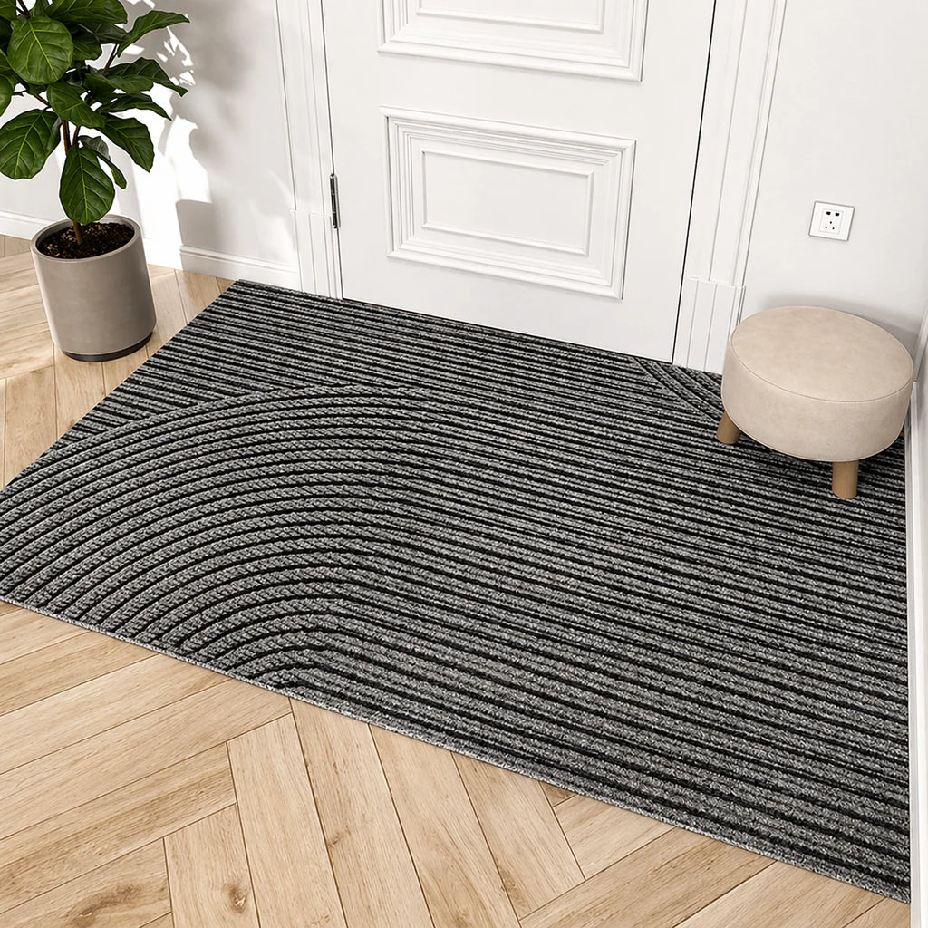 Non-slip rubber backing of door mat keeps it in place