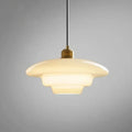 Stylish modern pendant light featuring glass and brass accents, ideal for kitchen settings. Dimensions: 12 x 12 x 16 inches. Lur 0