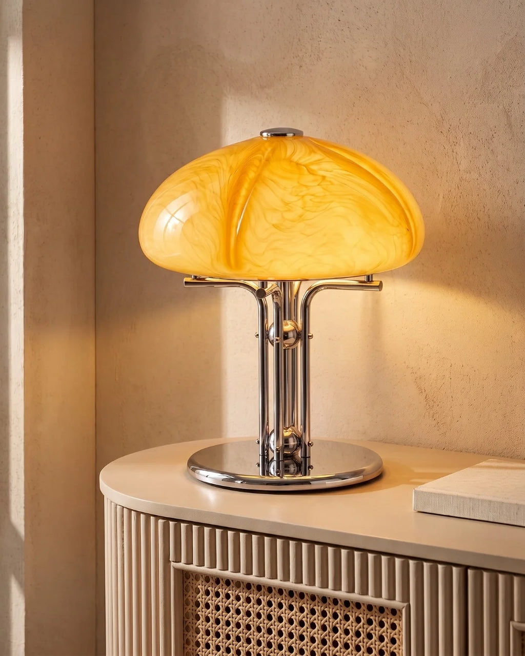 Amber mushroom lamp on rattan cabinet