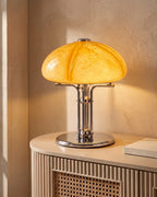 Amber mushroom lamp on rattan cabinet