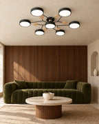 Black modern ceiling light over sofa