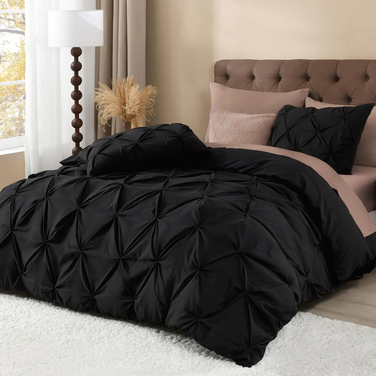 Black pinch pleat duvet cover with blush reverse