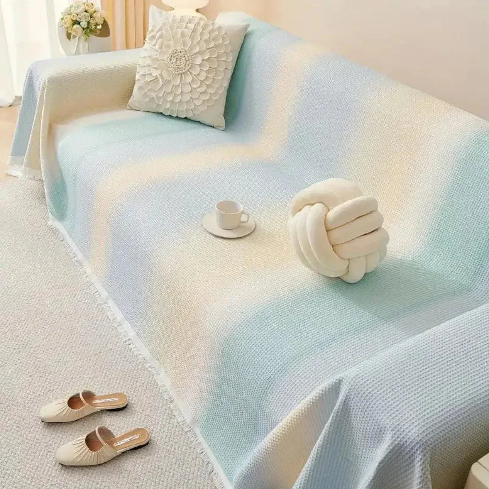 Blue and cream striped waffle couch cover on sofa