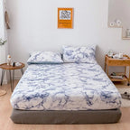 Blue marble fitted sheet on bed