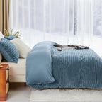 Blue striped fleece duvet cover on bed