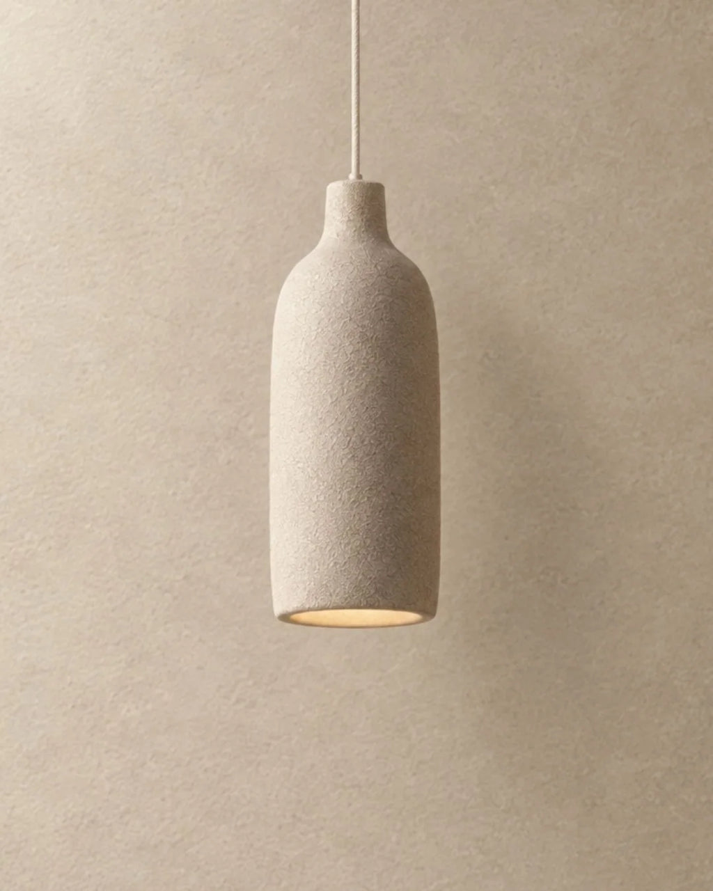 Bottle-shaped textured pendant light