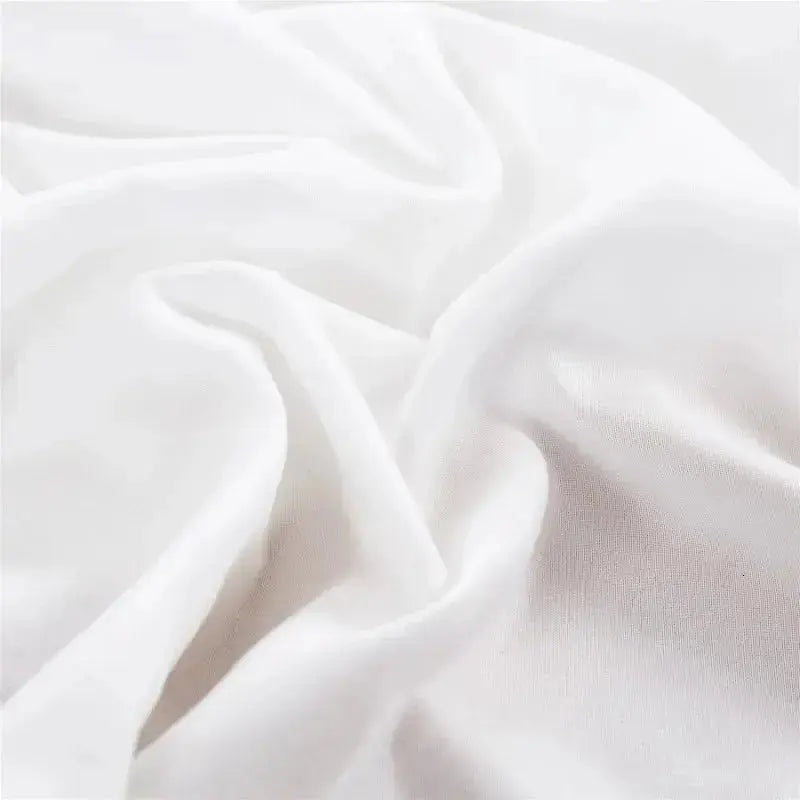 Close-up of brushed white bed skirt fabric