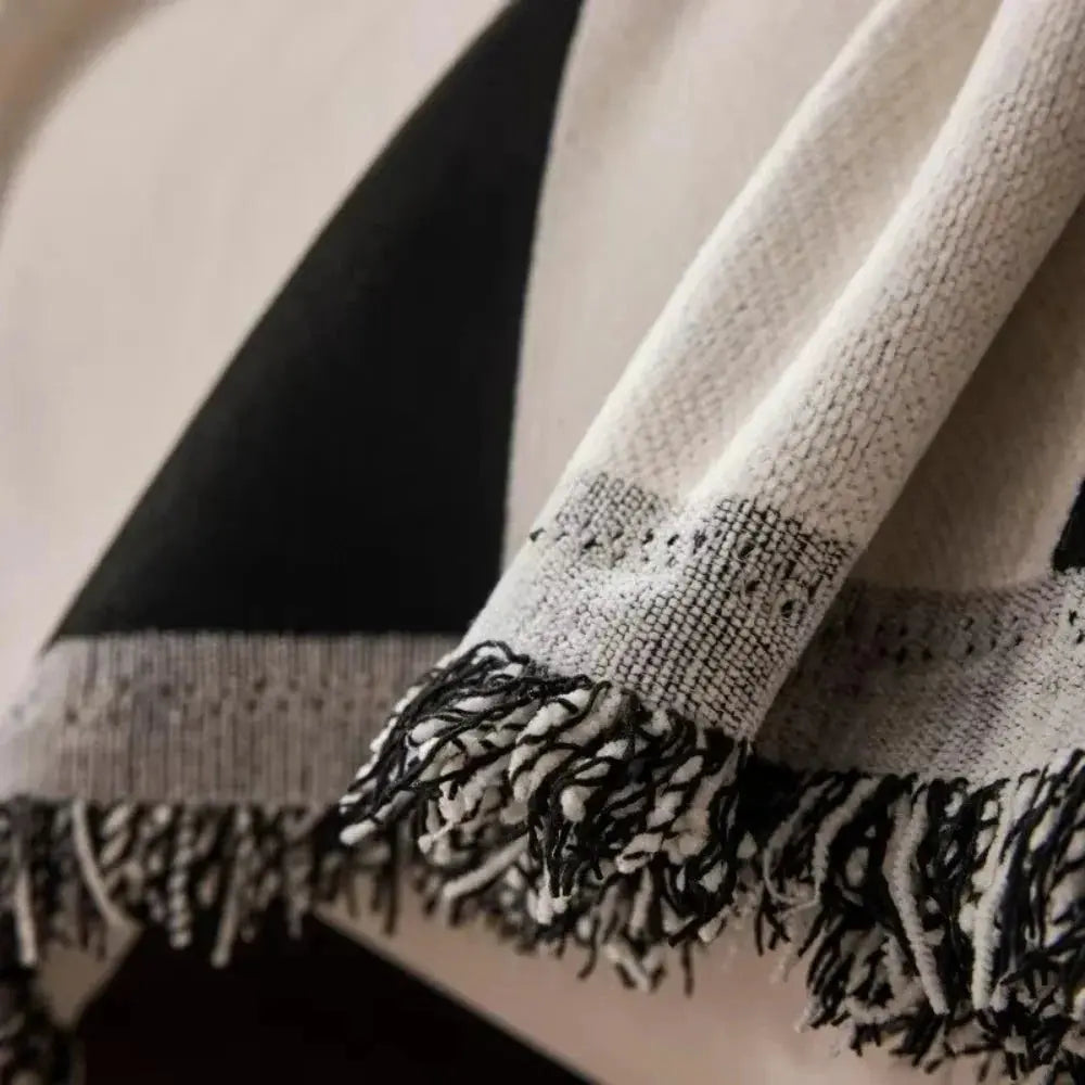 Close-up of chenille fabric and fringe edge