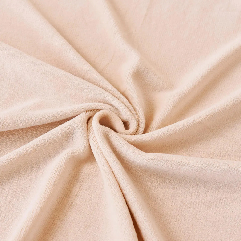 Close-up of cream plush velvet fabric