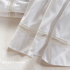 Close-up of crochet lace trim on bed skirt
