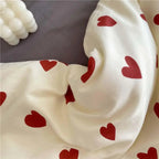 Close-up of red heart print fabric