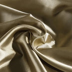 Close-up of silky champagne satin fabric