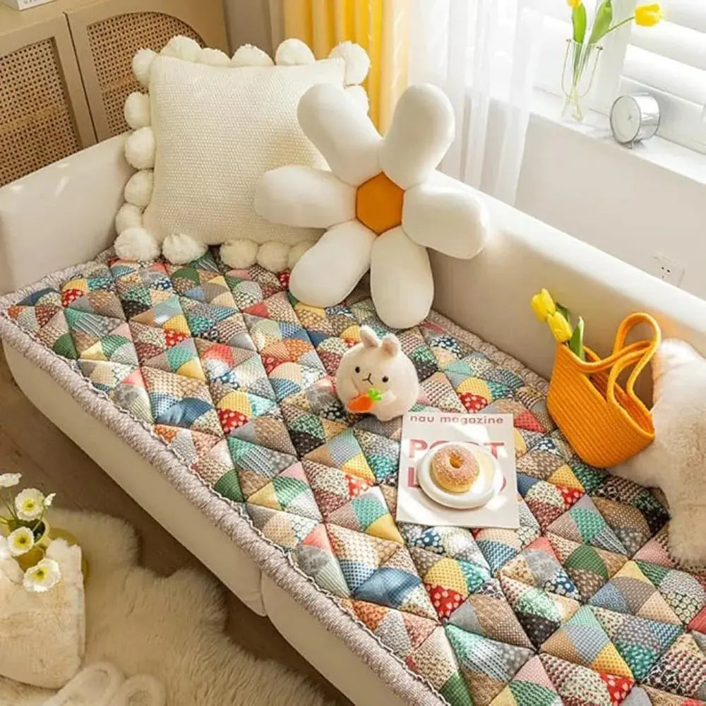 Colorful patchwork couch cover for pets on sofa