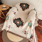 Cream Aztec throw on armchair