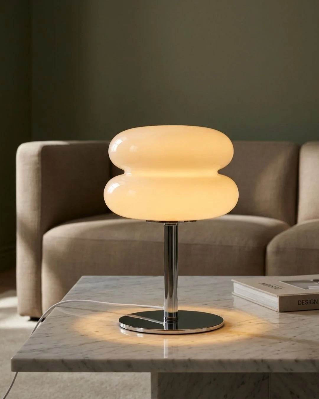 Cream glass lamp on coffee table