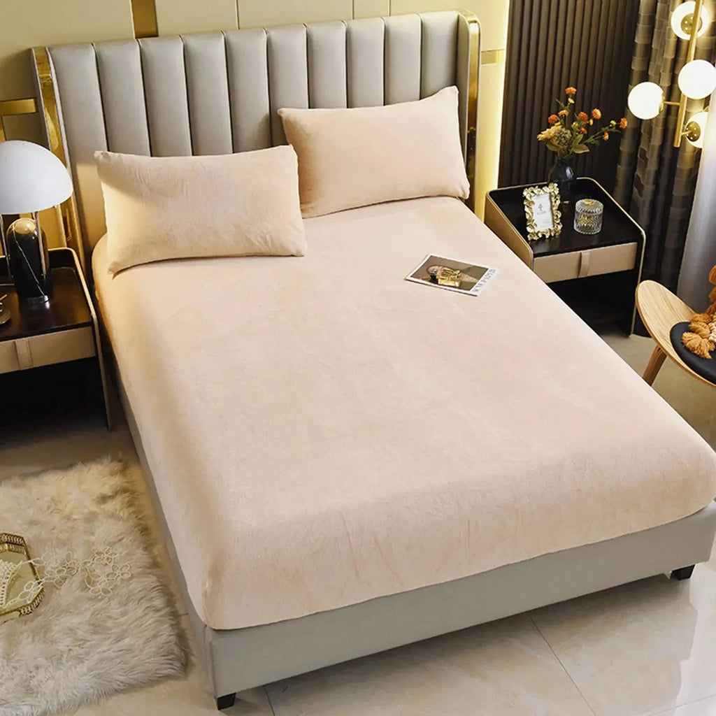 Cream velvet fitted sheet on bed
