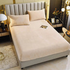 Cream velvet fitted sheet on bed