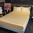 Cream yellow bamboo fitted sheet on bed