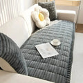 Dark gray plush couch cushion cover on sofa seat