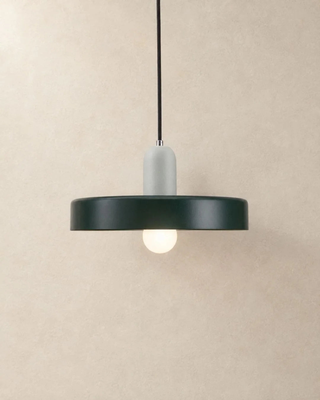 Dark green pendant light with white holder