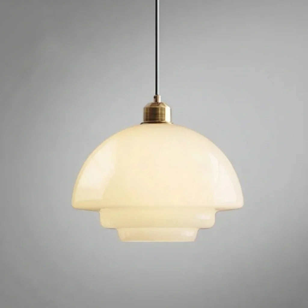 Dome milk glass pendant light with brass cap