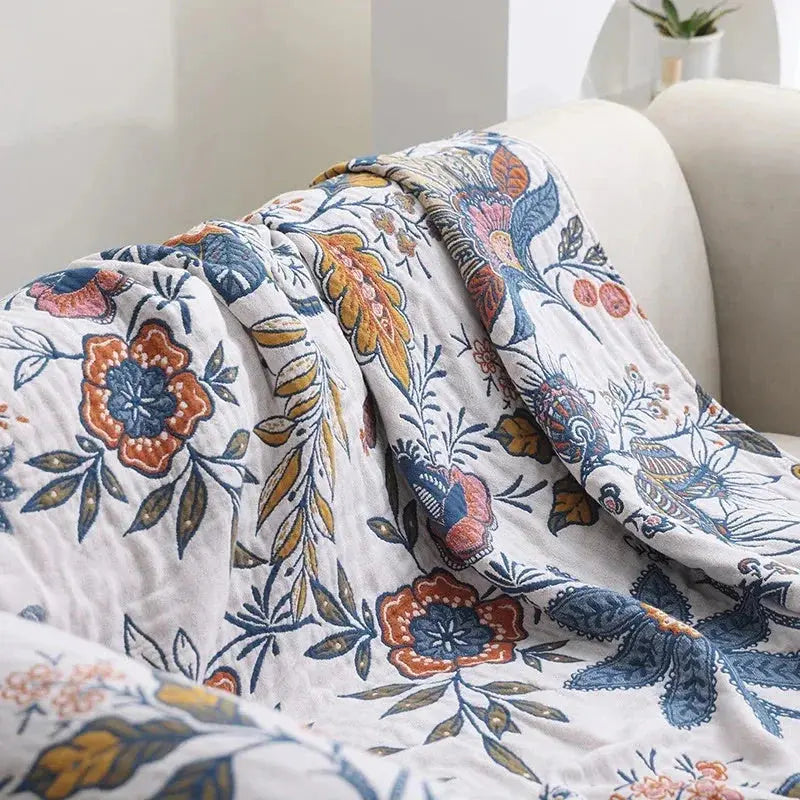 Floral cotton gauze throw on sofa