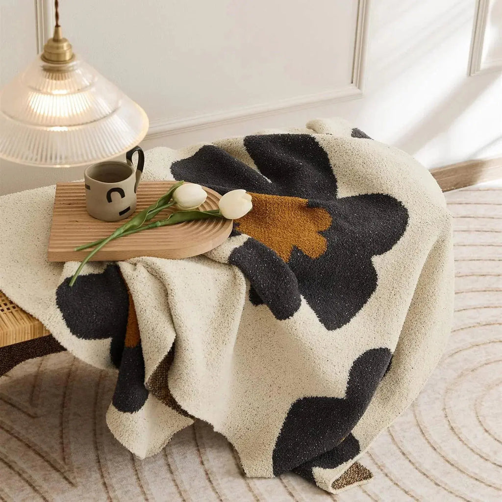 Floral throw blanket with cup and tray