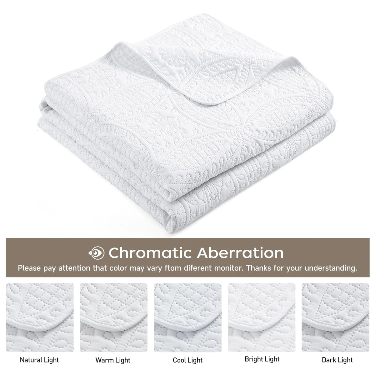 Folded white quilt and color guide