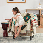 Girl sitting on chair with Aztec throw blanket