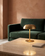Gold dome lamp on coffee table