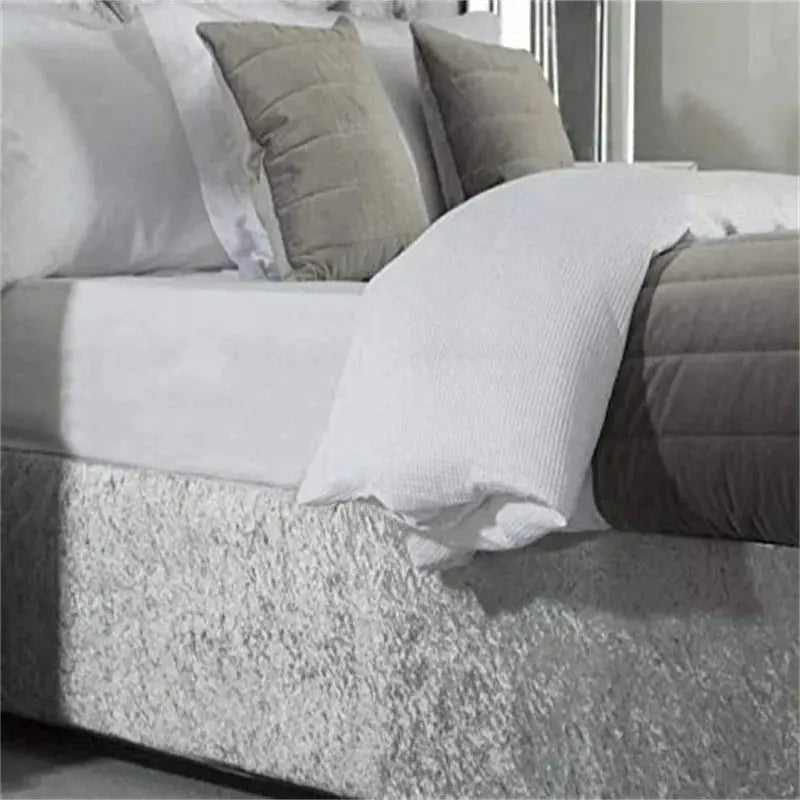 Gray crushed velvet bed skirt with pillows