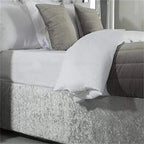 Gray crushed velvet bed skirt with pillows