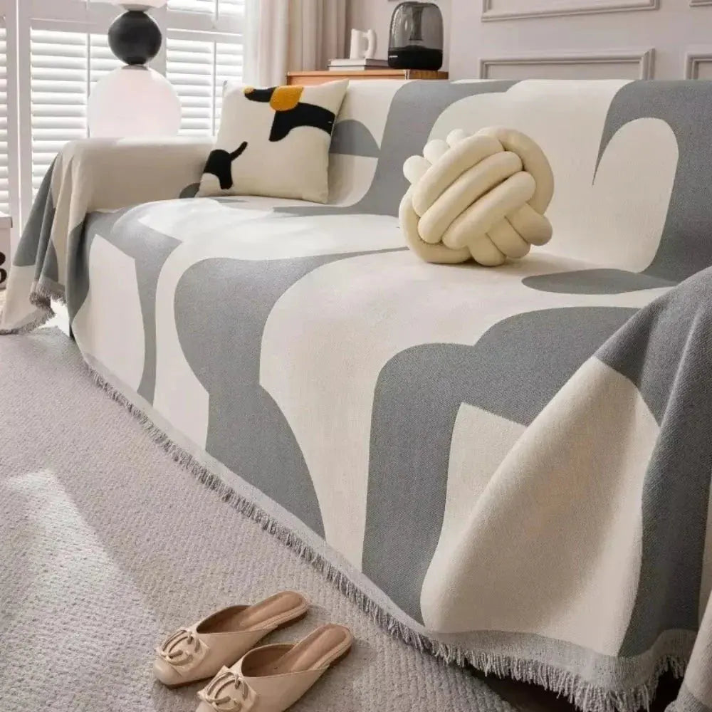 Gray geometric chenille couch cover on sofa