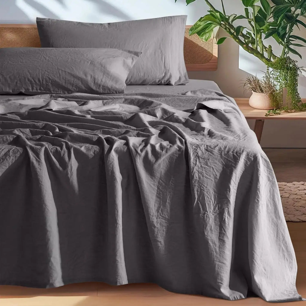 Gray linen sheet set on bed