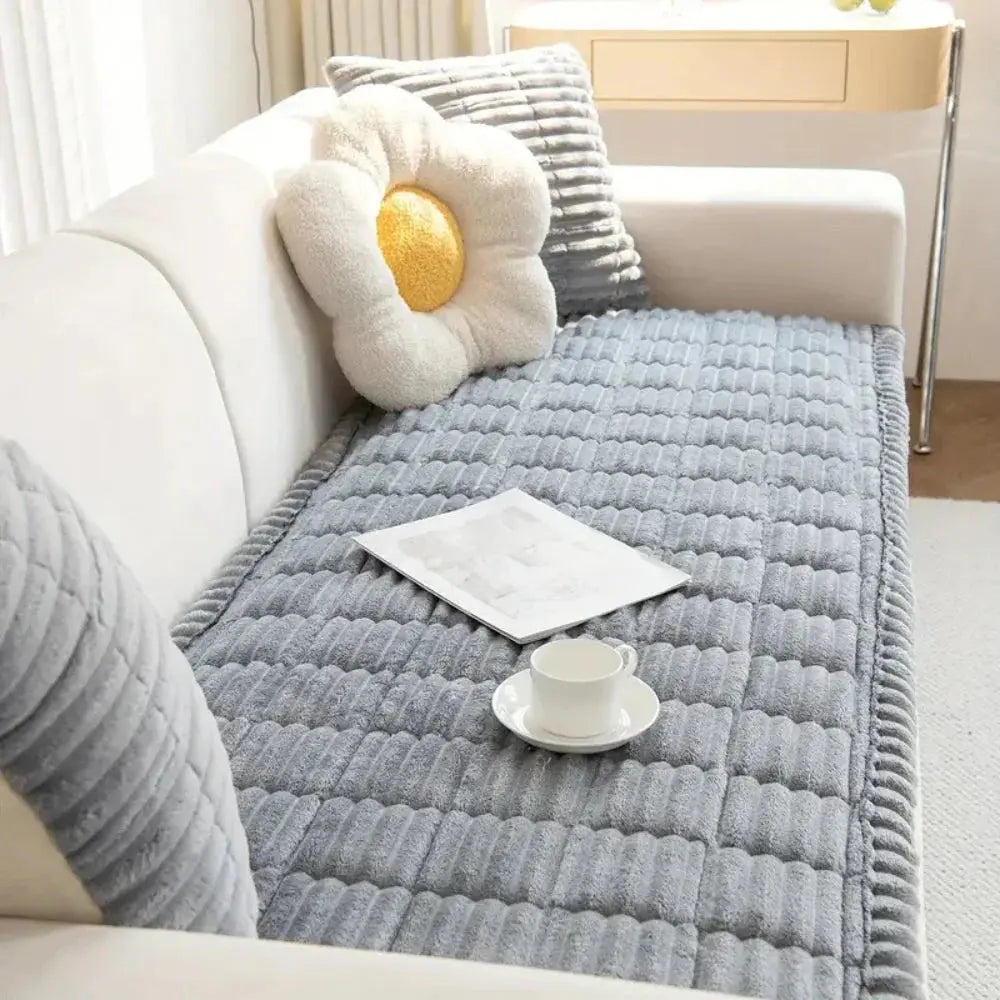 Gray plush sofa seat cover with daisy pillow