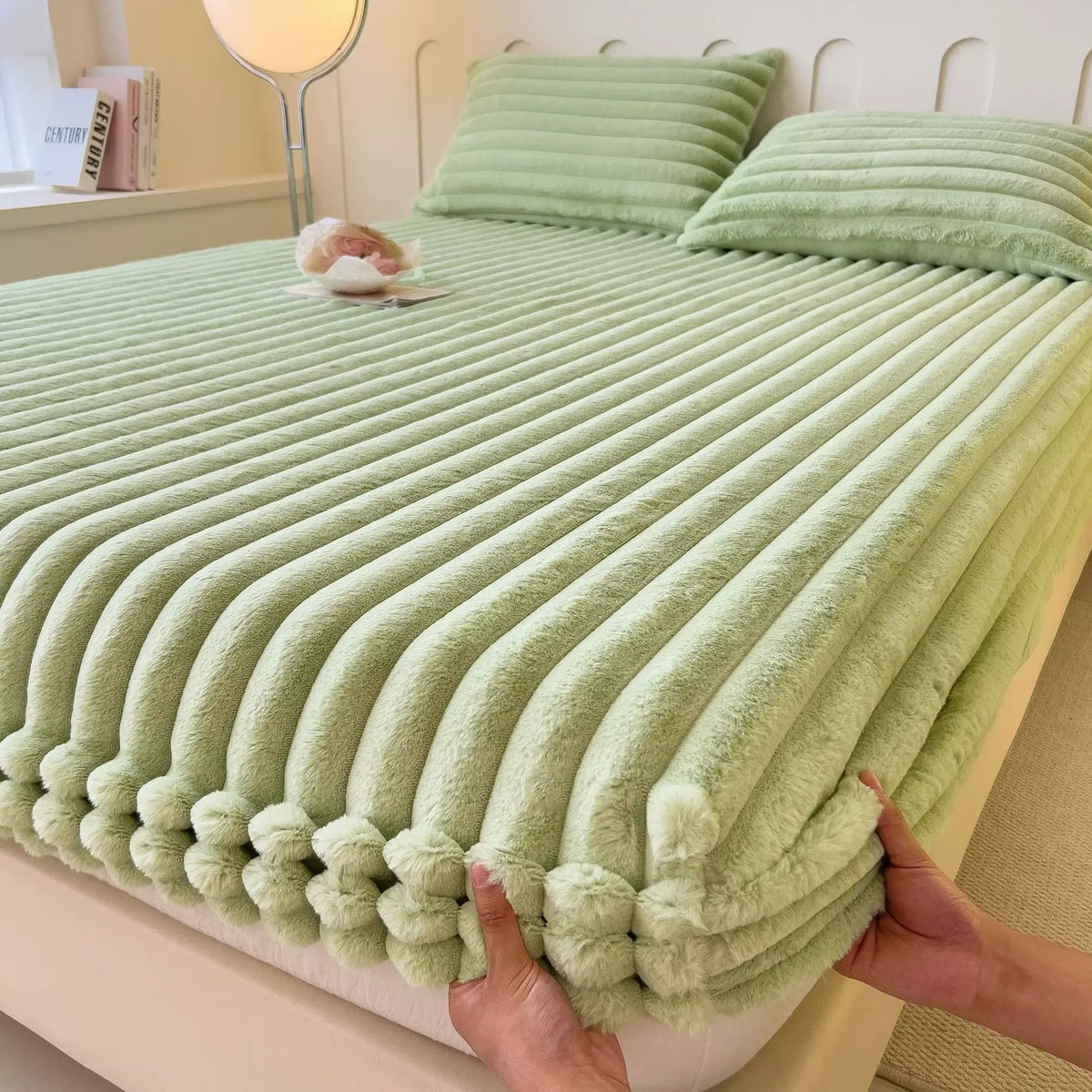 Green faux fur fitted sheet on bed