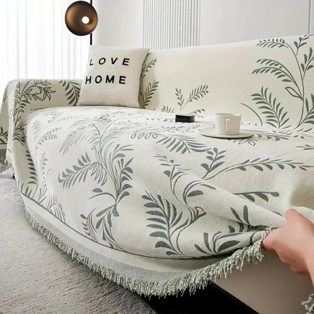 Hand lifting chenille couch cover with tassel trim