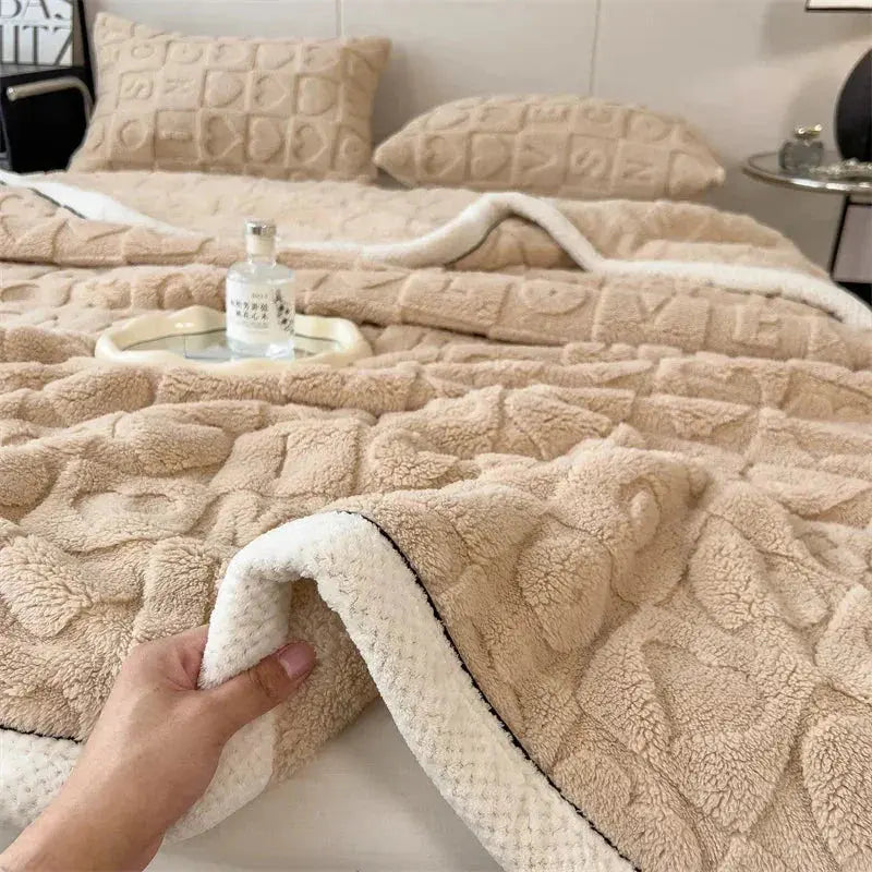 Hand showing sherpa back of fleece blanket