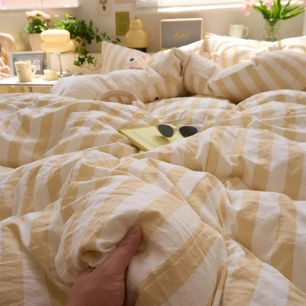 Hand touching soft crinkled cotton quilt