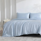 Light blue bamboo sheet set on bed