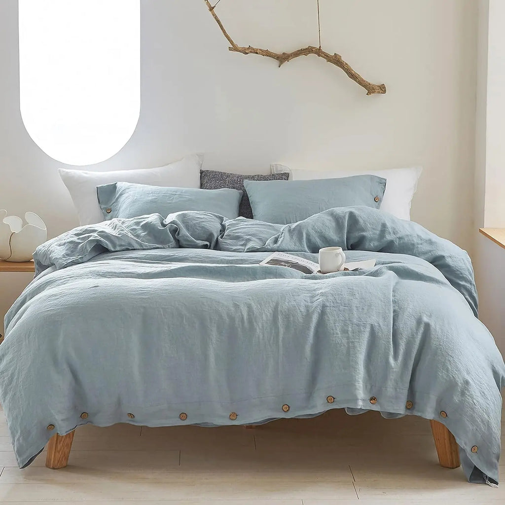Light blue cotton duvet cover set on bed