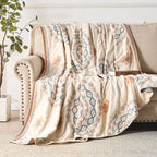 Lightweight boho bedspread draped over bed