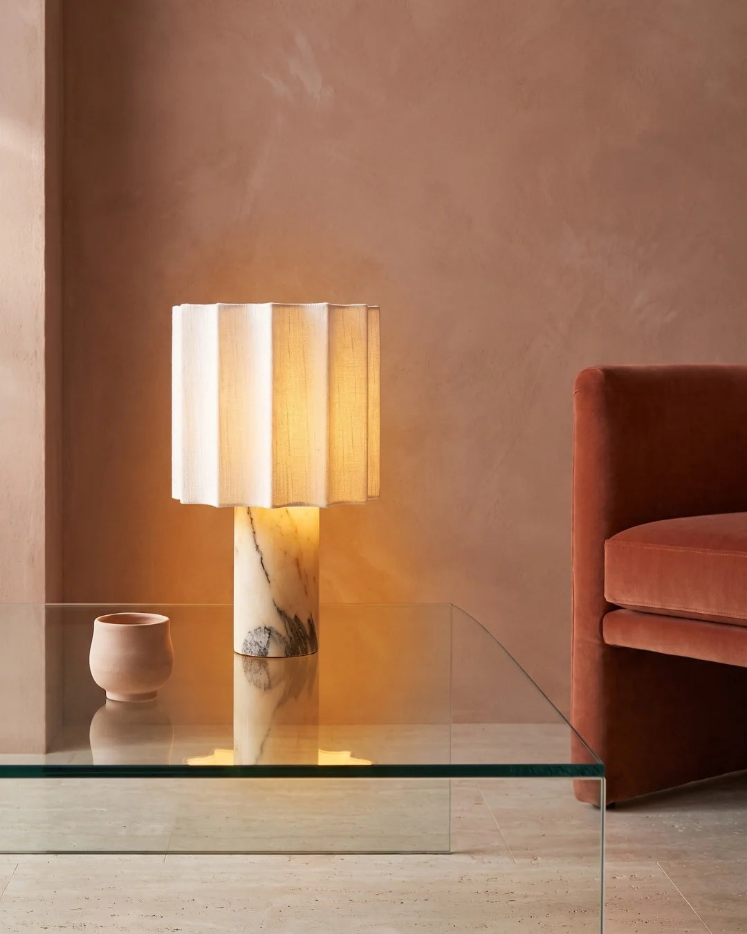 Marble lamp on glass side table