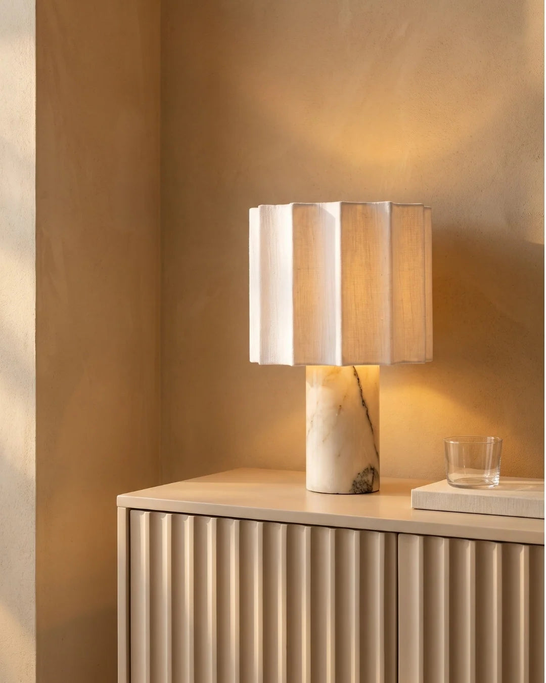 Marble lamp on sideboard
