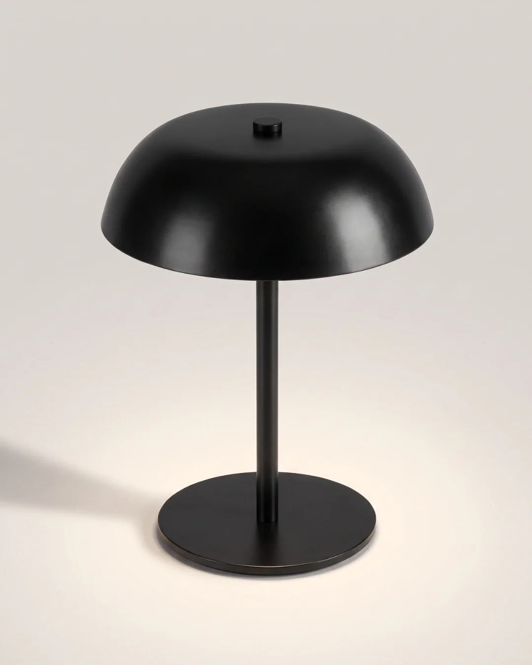Matte black cordless dome table lamp