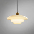 Milk glass tiered pendant light with brass cap