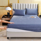 Navy blue velvet fitted sheet on bed