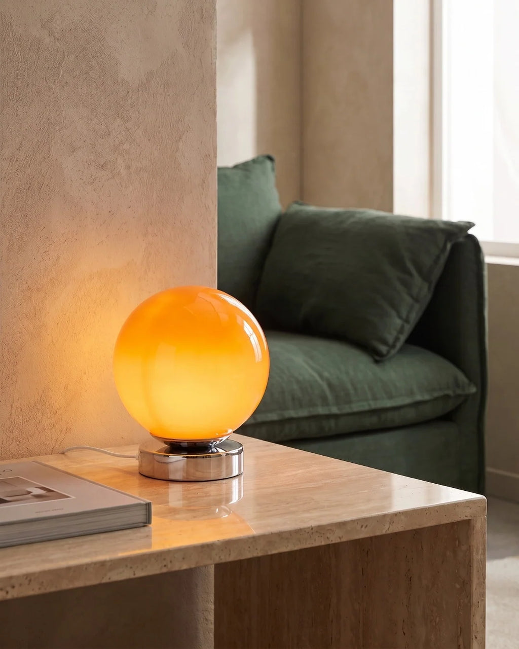Orange globe lamp on coffee table
