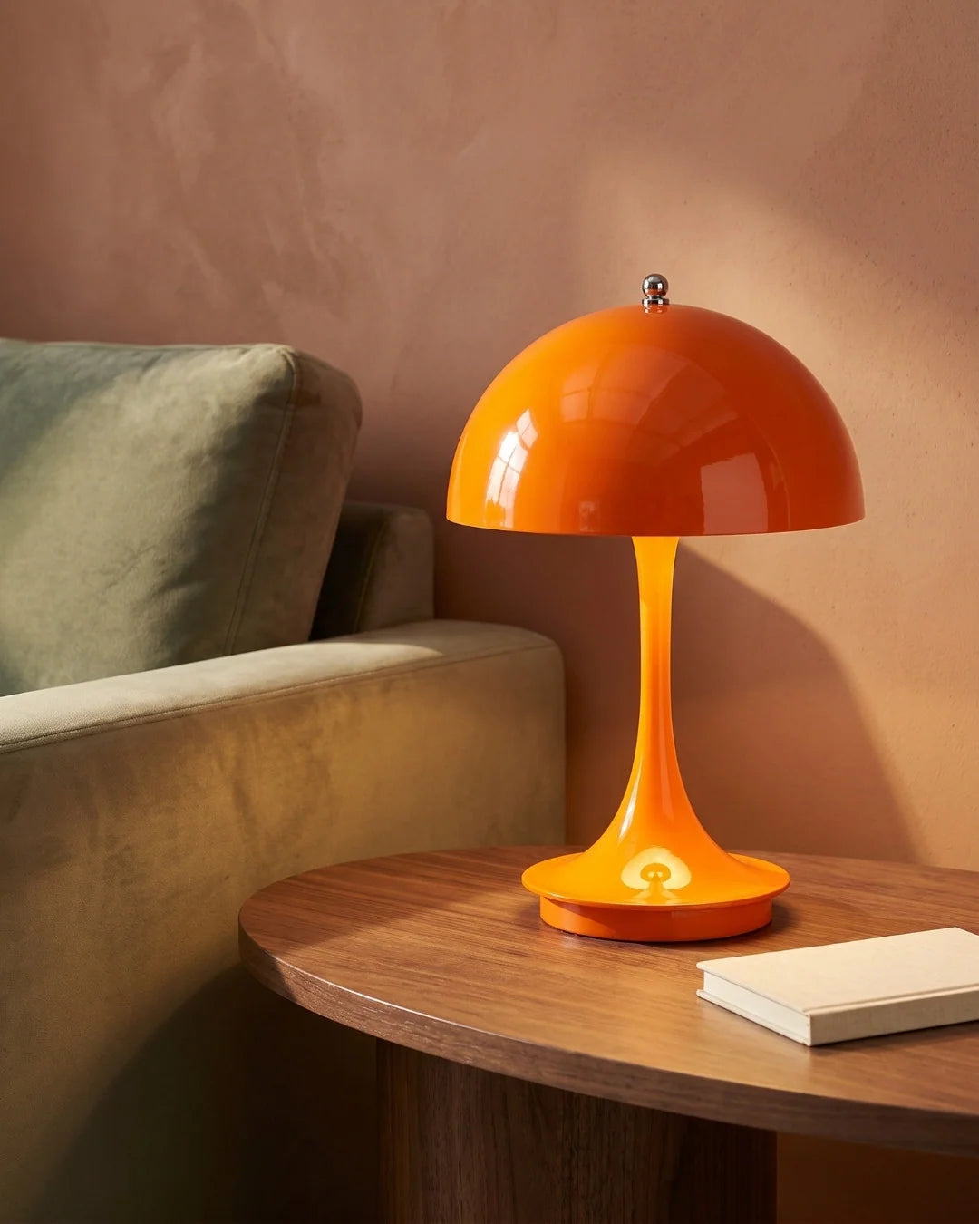 Orange mushroom lamp on side table